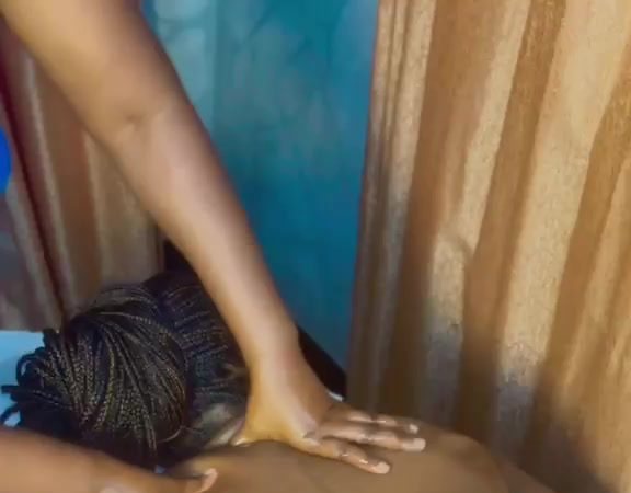 Gentle lymphatic drainage massage on a client's back